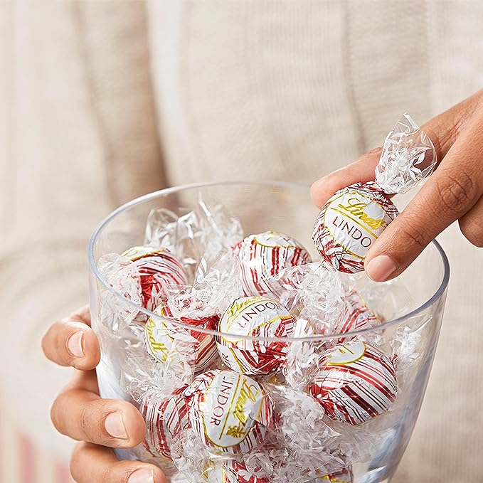 Lindt LINDOR White Chocolate Peppermint Candy Truffles with Smooth Peppermint Truffle Center, 19 oz. Bag